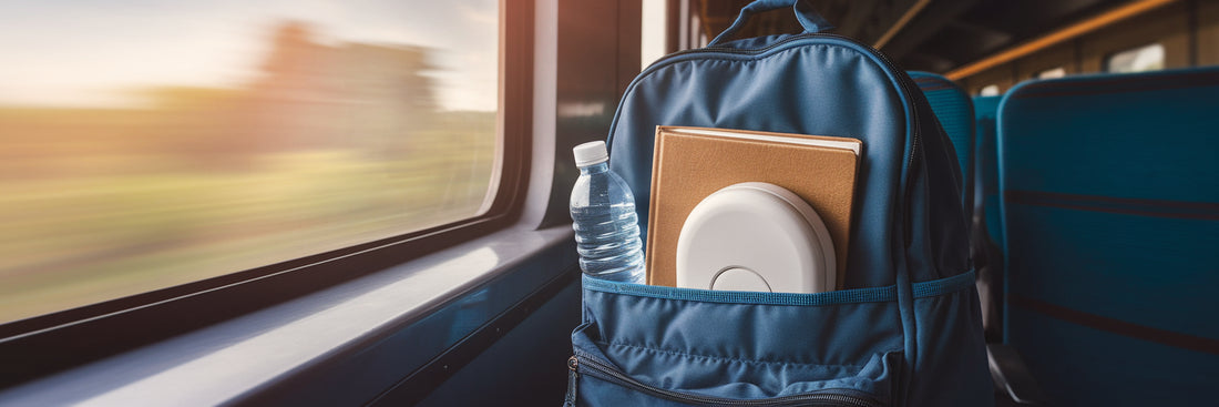 Portable bidet in travel backpack.